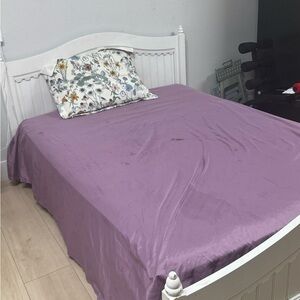 Elegant Purple Bedspread with Floral Pillow